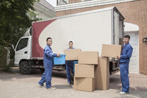 Professional team handling furniture for pick-up in Marylebone