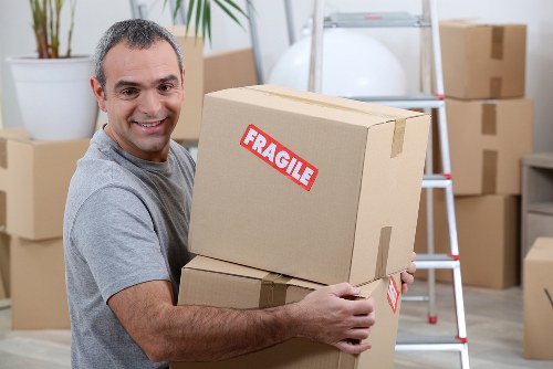 Customer service representative assisting with furniture pick-up